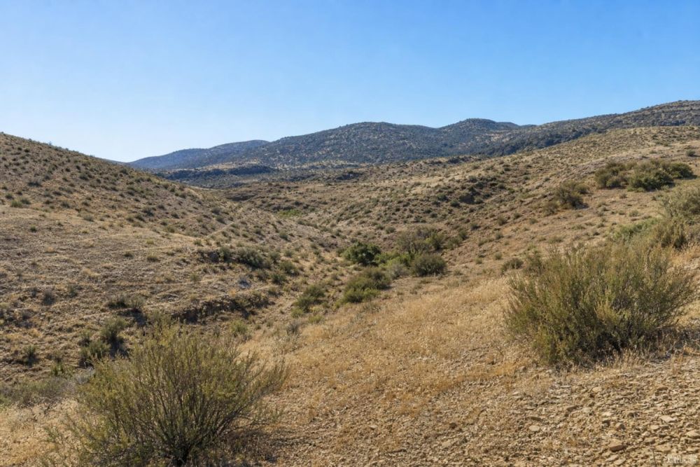 Listing image associated with the 0.23-acre California City land parcel on Carl Dr